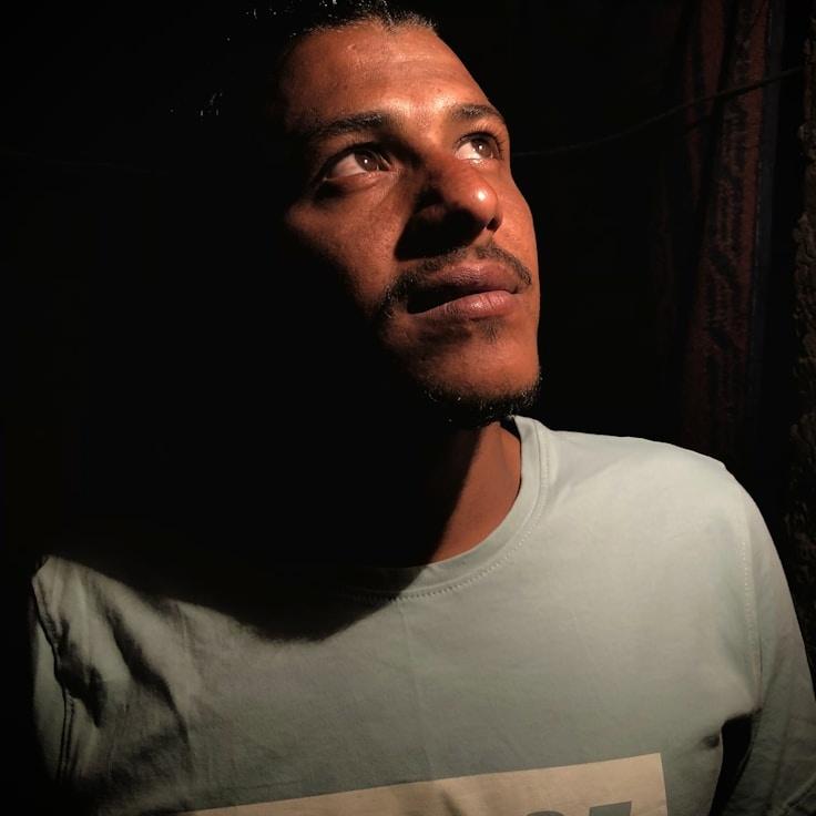 Kaveri Mehta, Lead Design Curator at Golden Sunrise Horizon, reviewing corporate floral arrangements